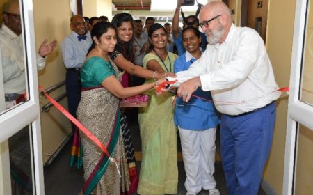 Foster (right) is shown here cutting the ribbon to inaugurate the Operation Eyesight Institute for Eye Cancer at LV Prasad Institute in Hyderabad, India in 2015.