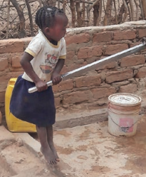 Little girl from Zambia now has access to clean water thanks to Operation Eyesight's donor-supported water programs to eliminate trachoma