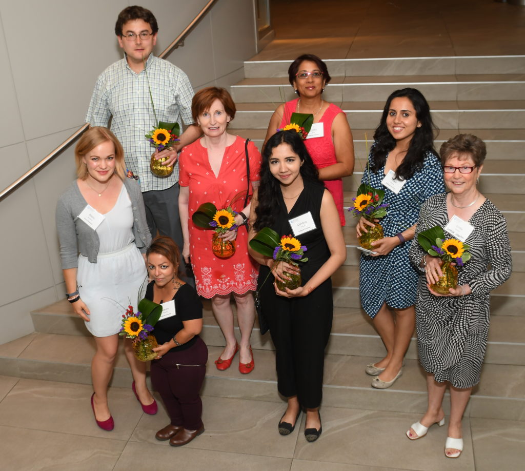 From left to right: Blaire (white dress), Tom (in checked shirt), Arezoo (front in black), Judy (red dress and brown hair), Candice (black), Lynda (glasses and red dress), Ritika (blue and white) and Linda at our 2018 Annual General Meeting.