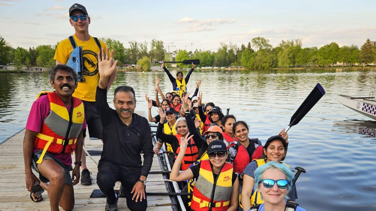 A picture of a partnership between dragon boat teams in Ottawa and Operation Eyesight.